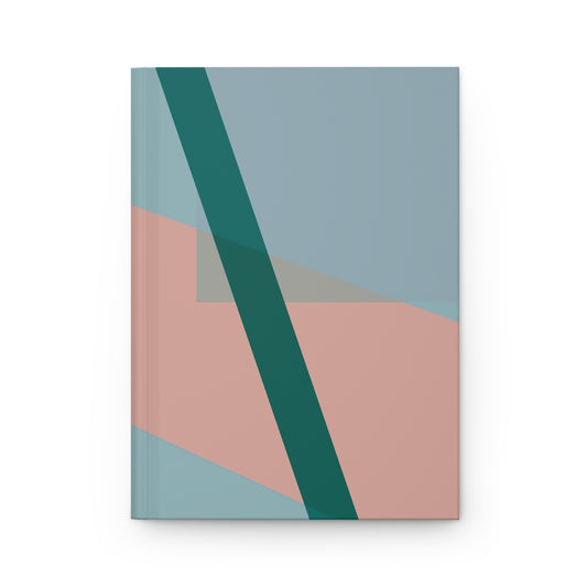 Hardcover journal with minimalist geometric cover in misty blue and blush, crossed by a bold deep-teal diagonal stripe.