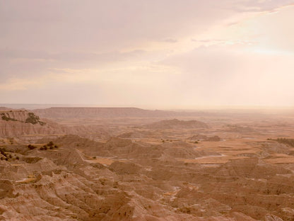 The Badlands landscape fine art photography print by Niqui Carter, warm earth tones desert terrain