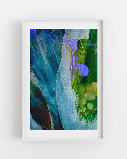 Framed abstract artwork with blue, green, and purple hues on a white background